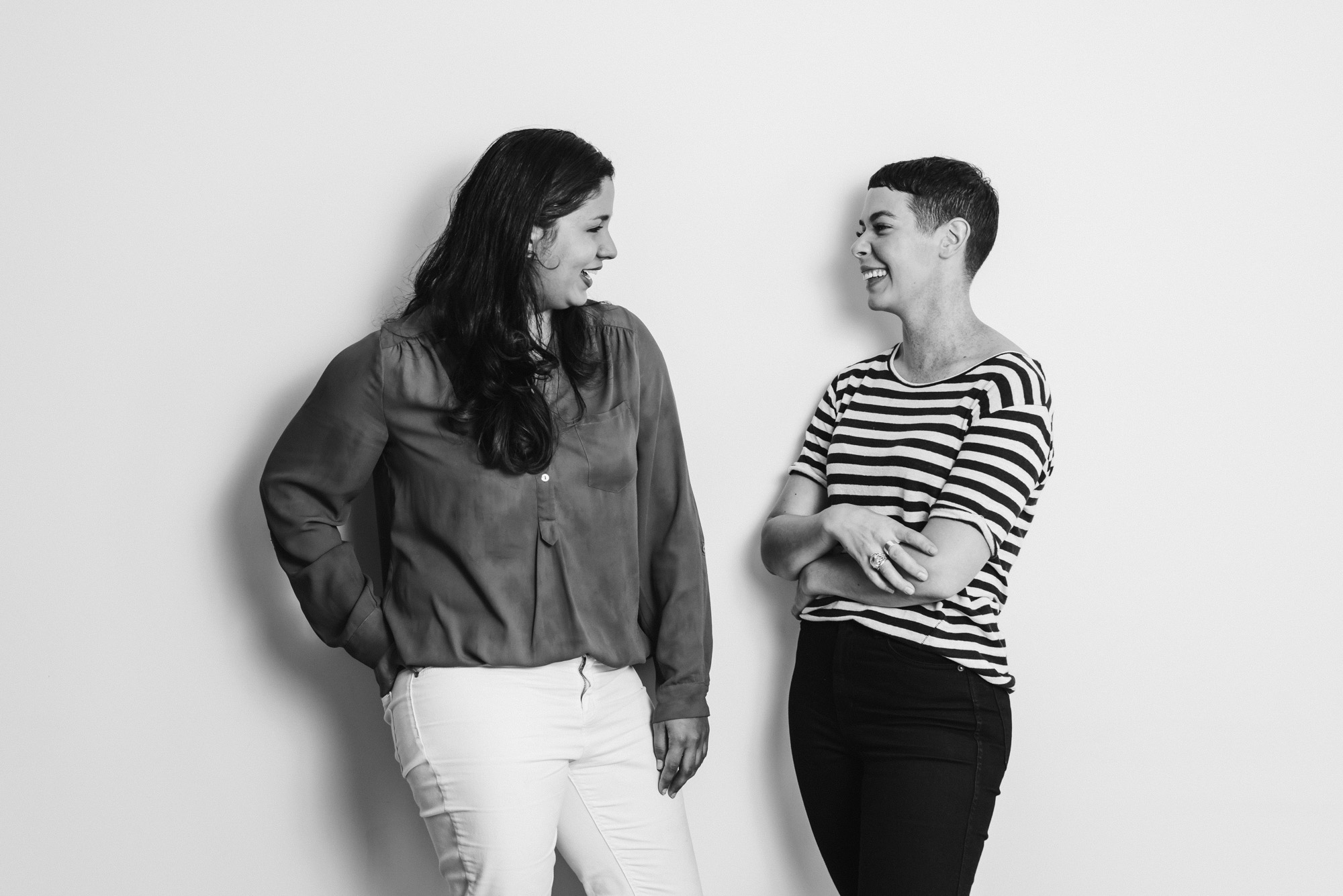 Two women talking and laughing with each other